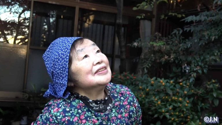 Image: Miwako looking at the zelkova tree (with copyright)